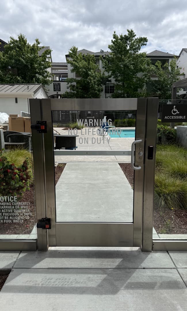 Access control reader installed at a controlled gate.