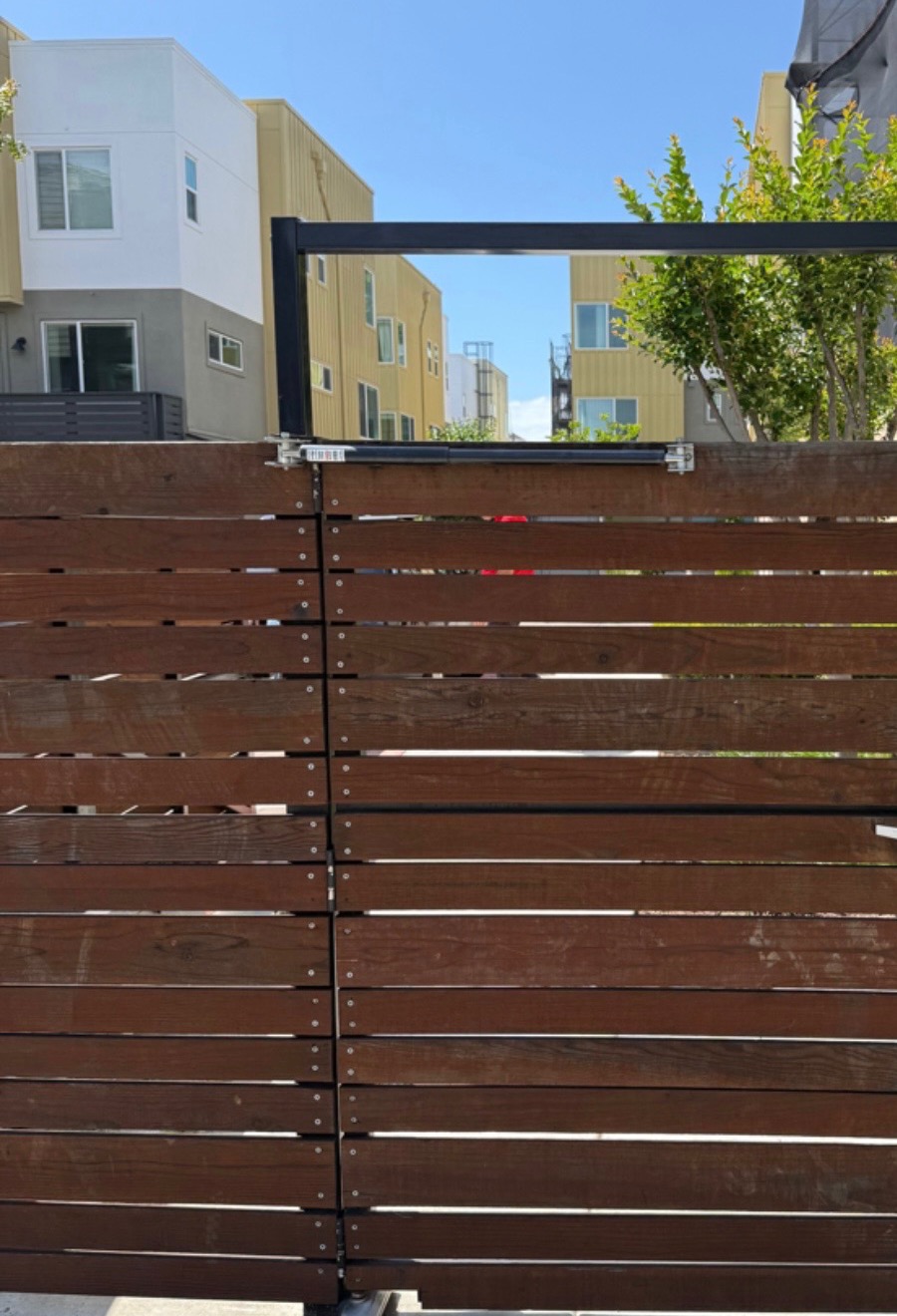 Access control and intercom equipment at a commercial gate entry.
